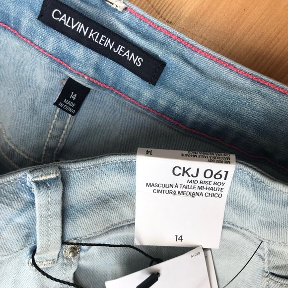 Calvin Klein Stretch Mini Denim Skirt in Light Wash & Colorblock Patchwork - Picture 5 of 7